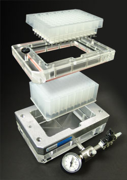 Vacuum manifold stacked parts